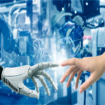 Image of a human hand and robot hand touching.